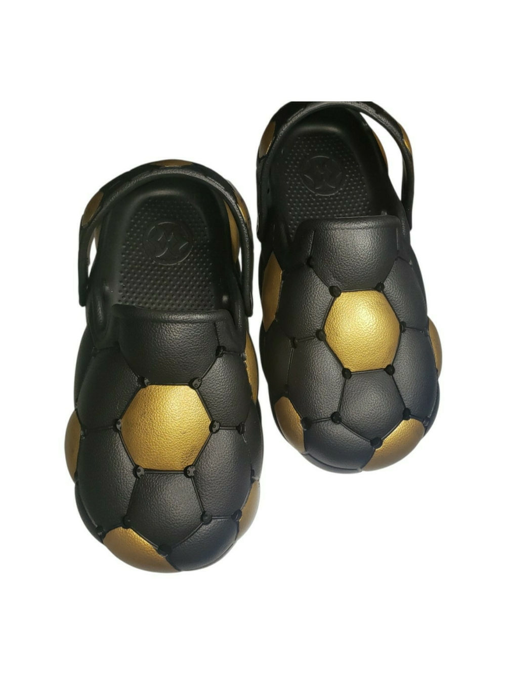 -loccer-ball-themed sports clog designed with a distinctive dimensional print.